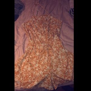 Junior mustard yellow floral romper